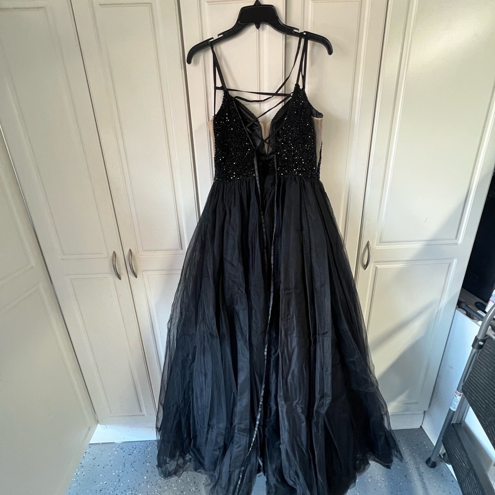 It is black, size 6,